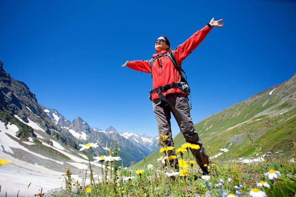 Hiker in Caucasus mountains